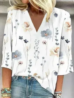 Blusa floral de manga 3/4 con cuello en V