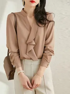 Blusa con cuello alzado con volantes lisos