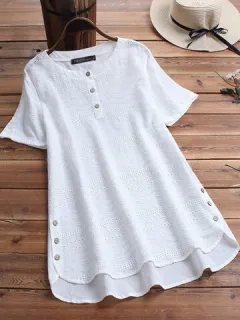 Blusa de encaje con botones laterales