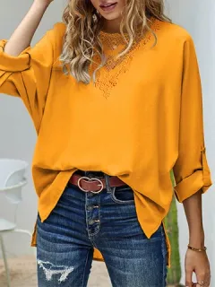 Blusa con dobladillo asimétrico y empalme de encaje