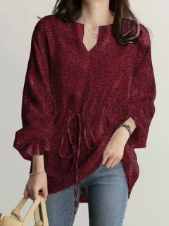 Blusa estampada con cordón en la cintura