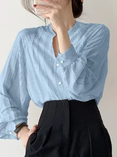 Blusa de manga larga de jacquard a rayas