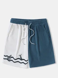 Pantalones cortos con bordado de olas de peces