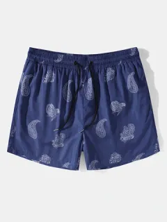 Shorts de playa con forro de malla y estampado de cachemira