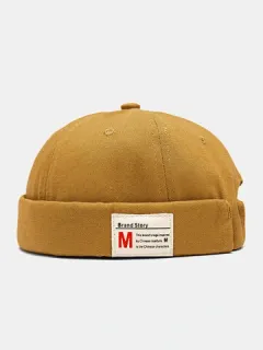 Gorra unisex con parche de letras de colores en contraste Cráneo