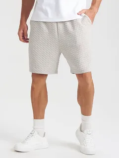 Pantalones cortos con textura geométrica Patrón