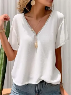 Blusa de algodón con cuello en V y empalme de encaje