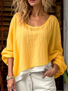 Blusa de algodón liso con dobladillo irregular