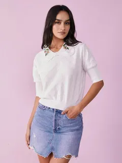 Blusa de punto con bordado floral