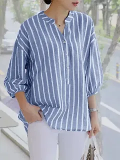 Blusa con mangas abullonadas y estampado de rayas