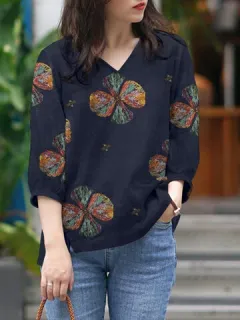 Blusa de algodón con cuello en V y estampado floral de colores