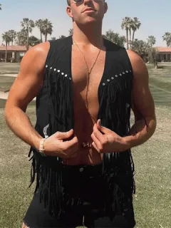 Open vest with fringe detail on the front