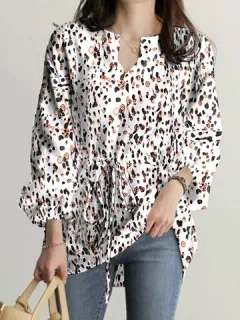 Printed blouse with drawstring waist and puff sleeves