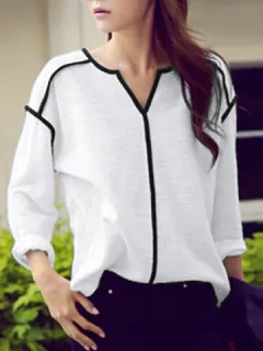 Blusa de manga larga con cuello en V en contraste