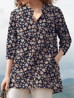 Blouse with pocket and all-over floral print