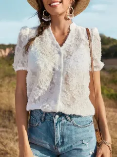 Blusa con botones de jacquard liso