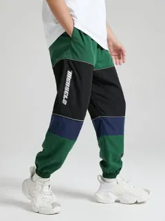 Joggers con estampado de letras en bloque de color