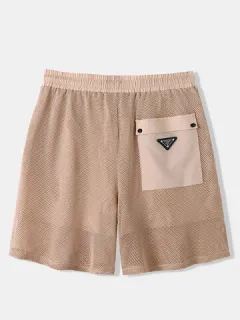 Shorts de malla con bolsillo con solapa